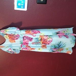 Cute Summer Floral print dress side slits, color is an aqua blue